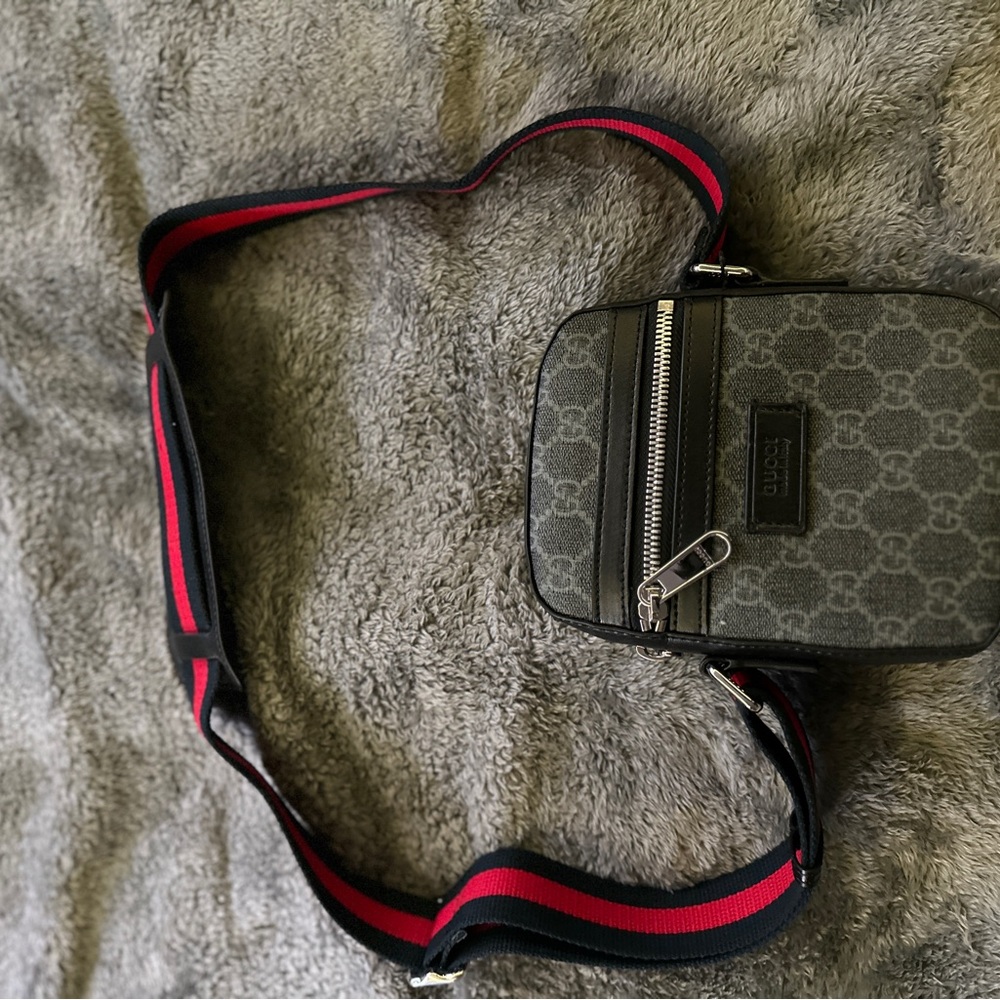Gucci Gray Messenger Bag with Monogram Pattern and Bold Strap